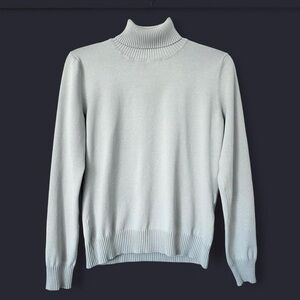 Chadwick’s pale minty blue turtleneck sweater